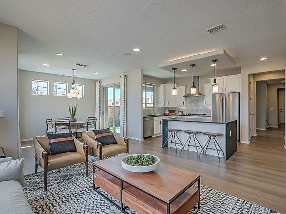 A living space on the first floor is open to the kitchen and cafe, making it a great space for enter