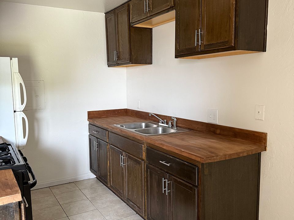 New spacious Cabinets and countertops. The sink and stove is new as well. The lighting in the kitchen and dining area has been replaced too.