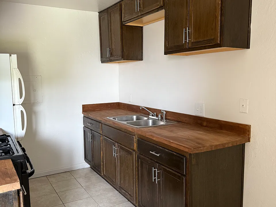 New spacious Cabinets and countertops. The sink and stove is new as well. The lighting in the kitchen and dining area has been replaced too.