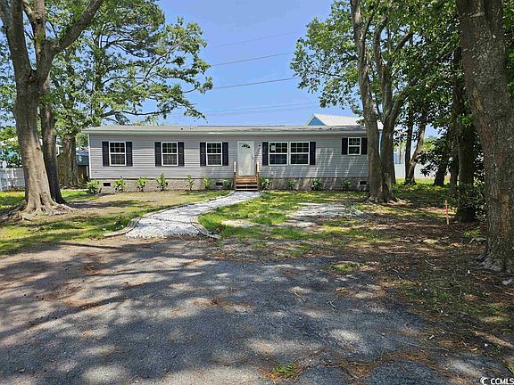 2nd image of 3485 Peachtree Ln. #Garden Lakes Village