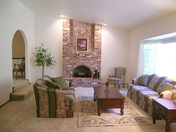 Spacious living room with vaulted ceilings.