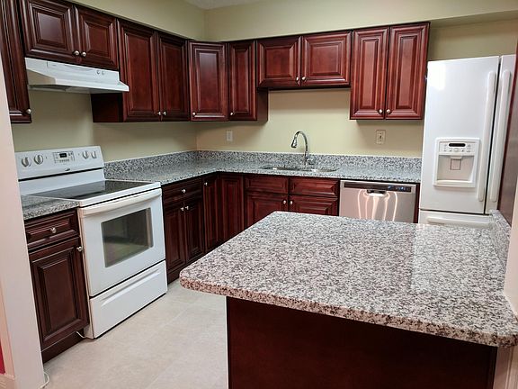 Kitchen with new granite countertops, new ceramic tile, new 