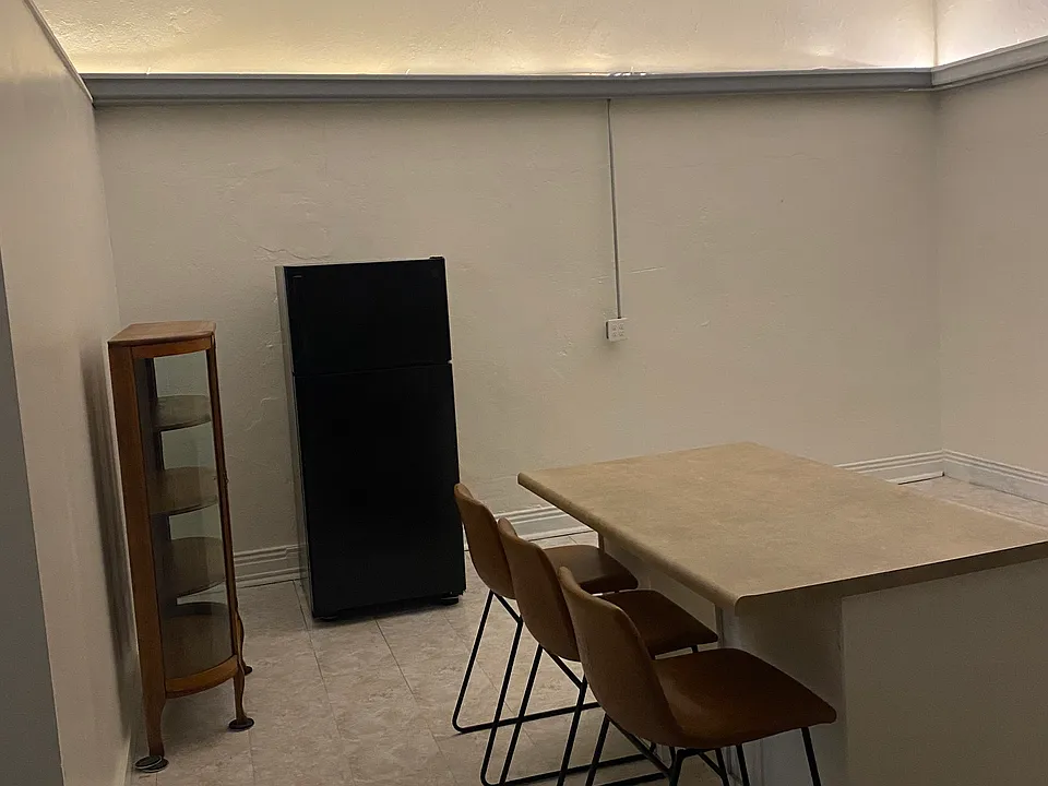 Antique cabinet and elevated ceilings