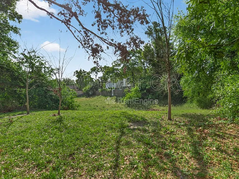 7608 Rain Forest Dr N — Photo 41