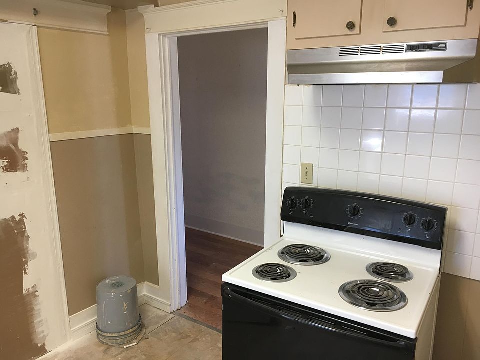 This is an electric range with vent hood.