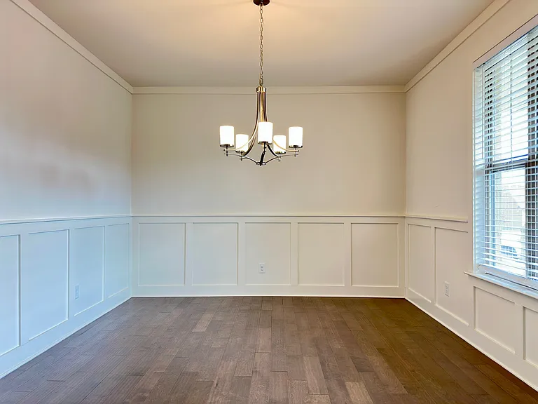 Elegant formal dinning room that can comfortably sit 12 people