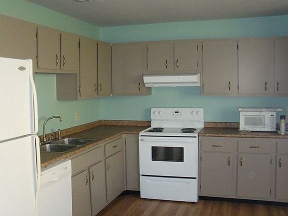 Updated kitchen includes stove, fridge, DW, W/D