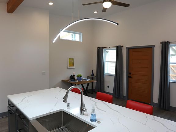 Open concept, vaulted ceilings, skylights, new quartz countertops, and all new appliances!
