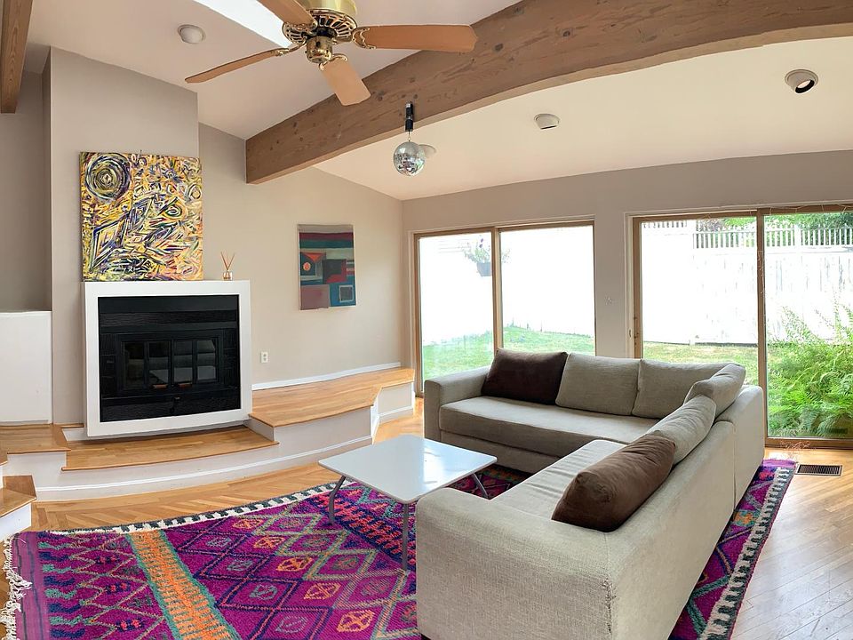 Family room with a wood working fireplace
