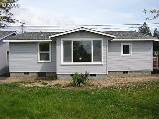 back of house/dining area overlooking yard