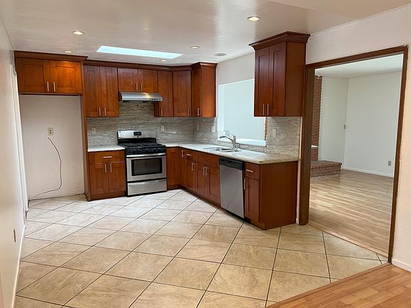 4th image of 8839 Dewsbury Ave