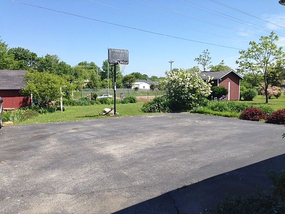 Blacktop to 2 car carport