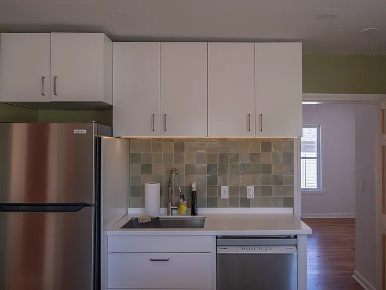 Kitchen and door to bedroom 1