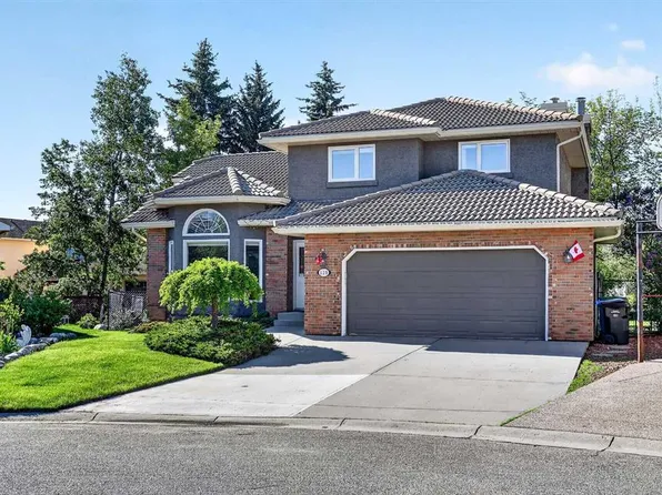115 NW Woodpark Ter SW, Calgary, AB T2W 6E7