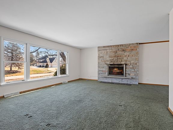 Main level living room with fireplace