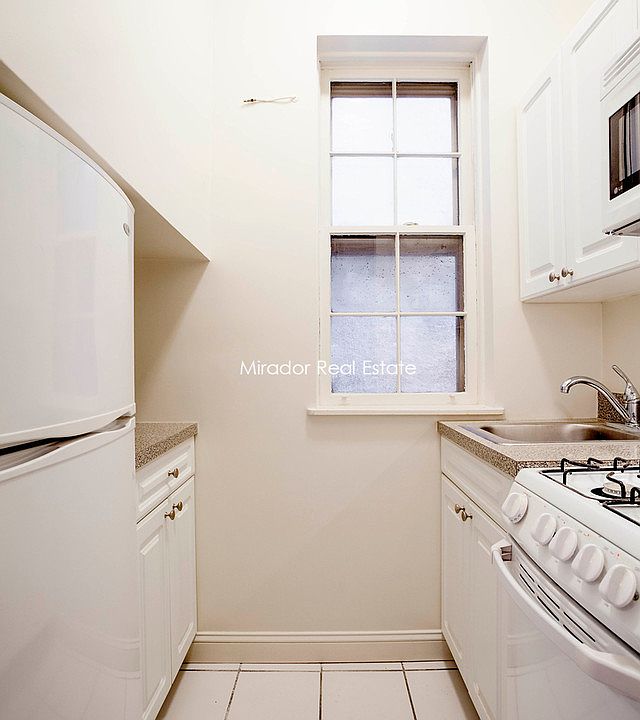 1st image of 112 E 11th St APT 1A
