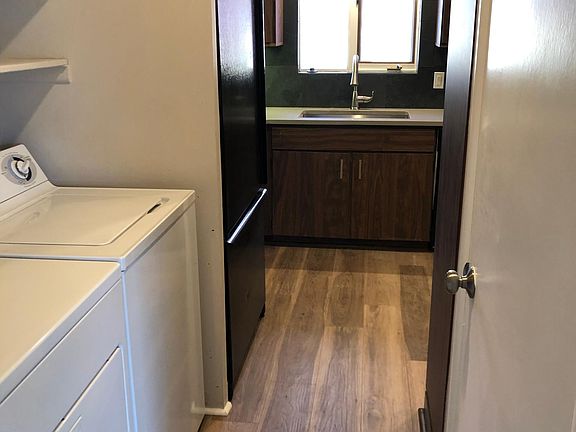 kitchen view, washer/dryer and pantry