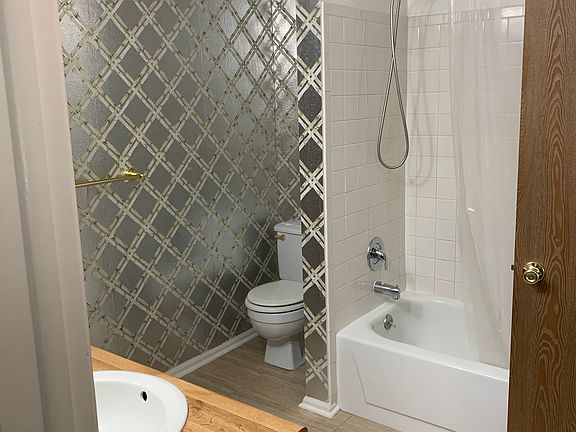 Main Bath- there is also a Vanity area with sink in the Main Bedroom