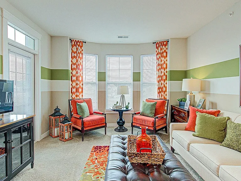 This living room shows off all the natural light _ plus, a door that opens to your private balcony or patio.