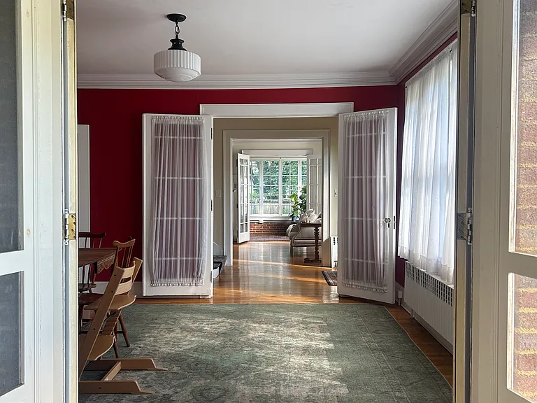 View from porch, through Dining Room and Living Room, to Sun Room.