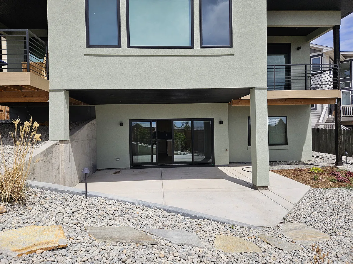 South-side entry into the lower-level rental rooms. - Larkspur Lane Level