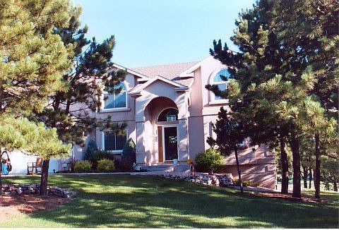 Custom stucco home located on cul-de-sac