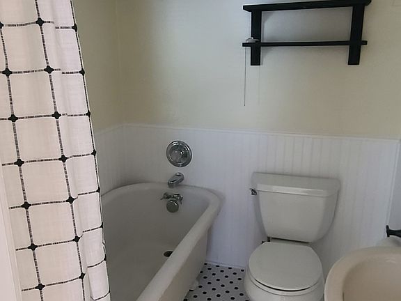 Full bath with a vintage claw foot soaking tub!