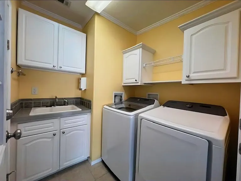 Laundry room with utility sink