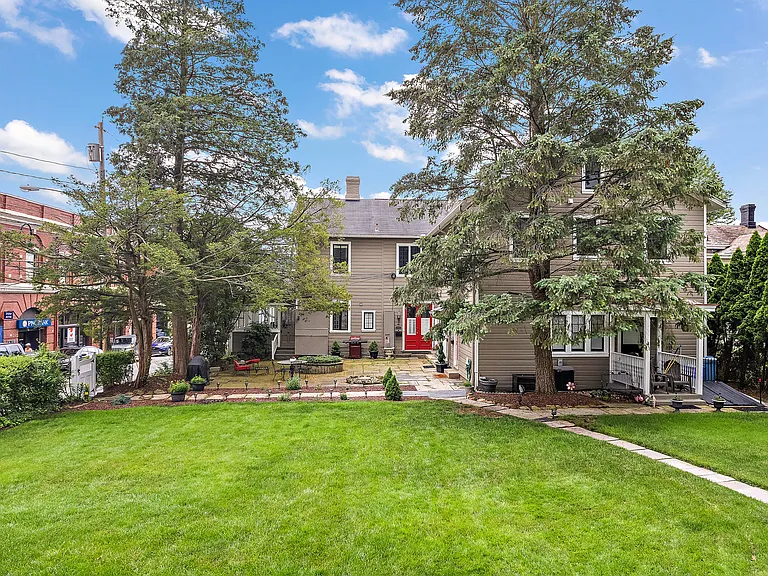 Yard with walkways from Blackburn Rd. and from designated parking spot on McCready Way.