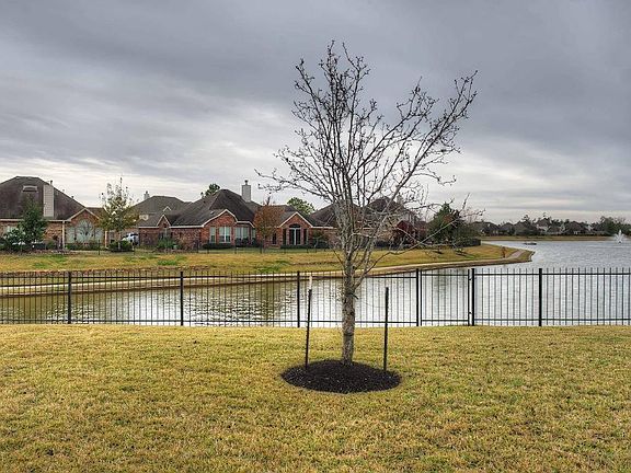 Check out the view in the backyard! Legends Ranch has a neighborhood pool, splash pad and exercise/weight room.