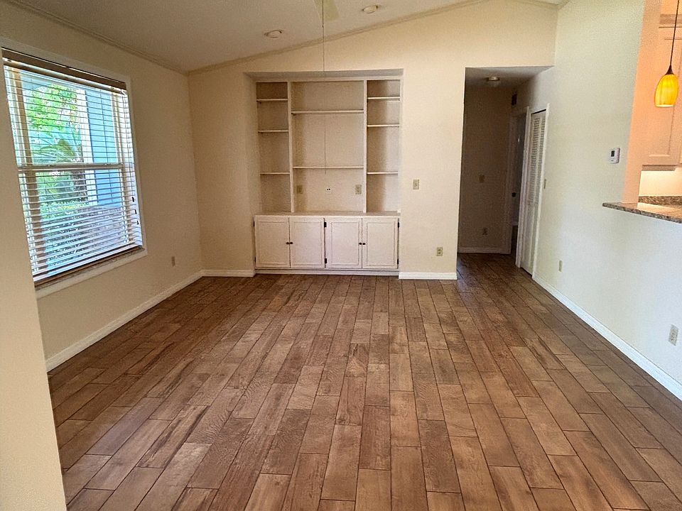 Family Room leading to 2 bedrooms and hall bath