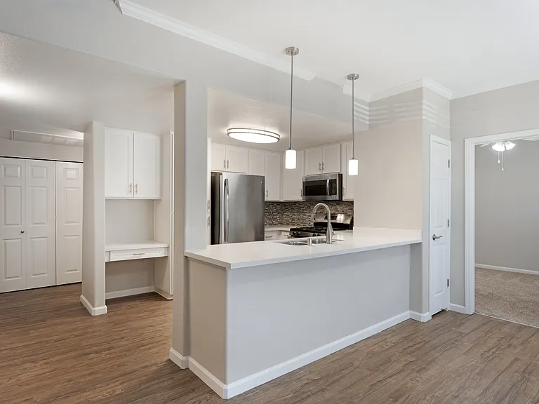 Our renovated units feature an open floor concept, creating spacious, modern living spaces designed for comfort and style at Ascent at the Galleria.
