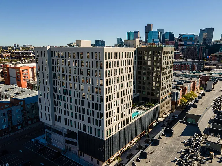 Discover the building's striking exterior, blending modern style with architectural elegance.