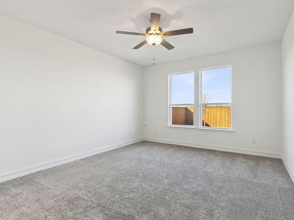 Elegant owner s suite with large windows real home pictured