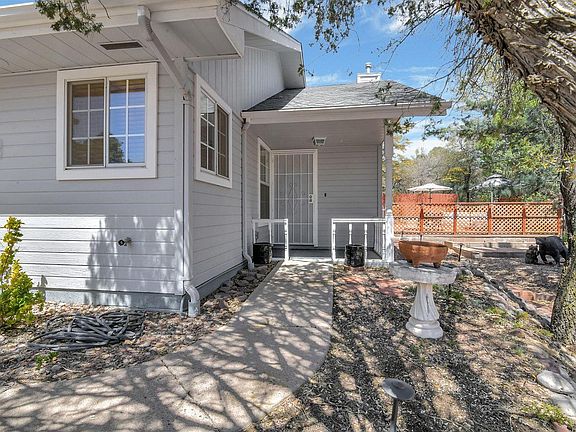 Right side of house looking 
at front door