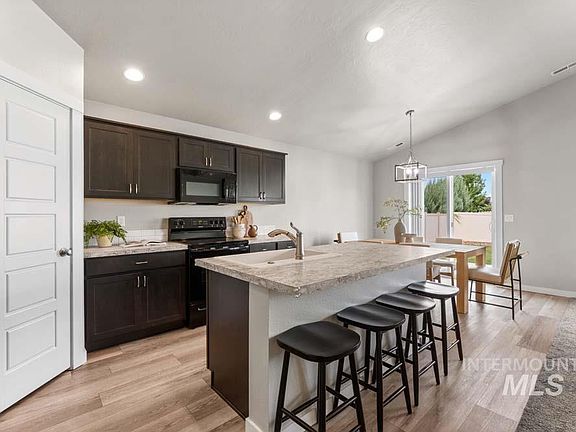 5th image of 5796 N Oakstone Ave