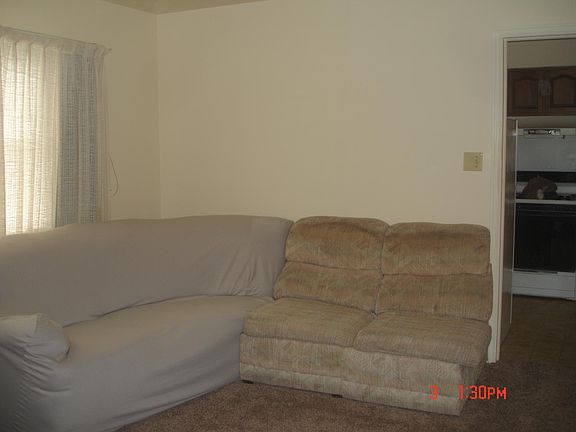 living room showing entrance to kitchen