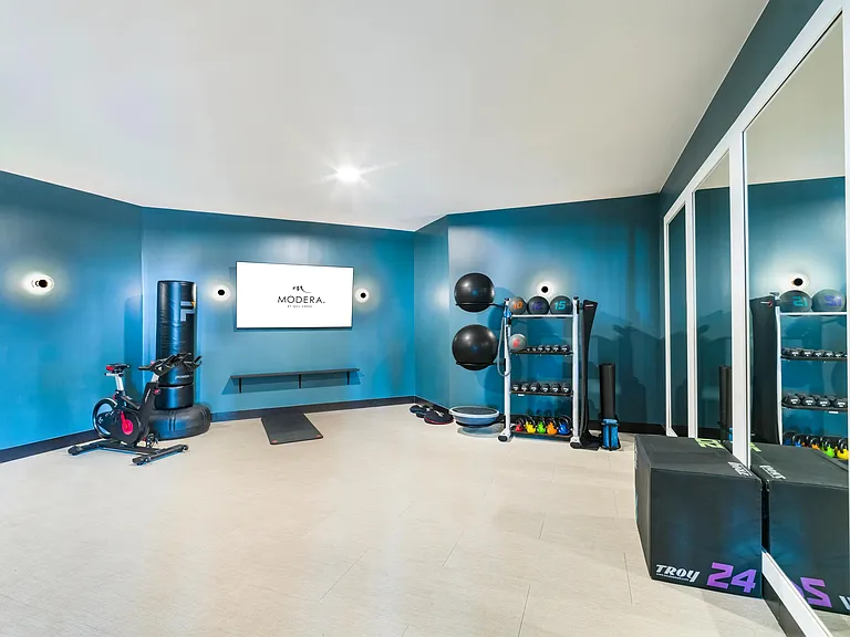 Find your rhythm in the fitness studio_perfect for interval training, yoga, or a solo session on the Peloton.