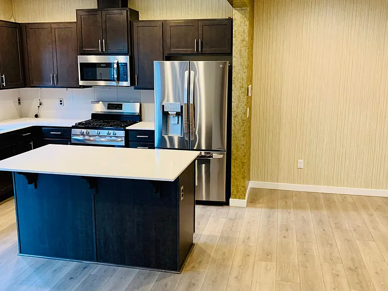 Kitchen with granite countertops.