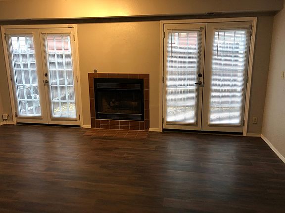 Fireplace and French doors to patio
