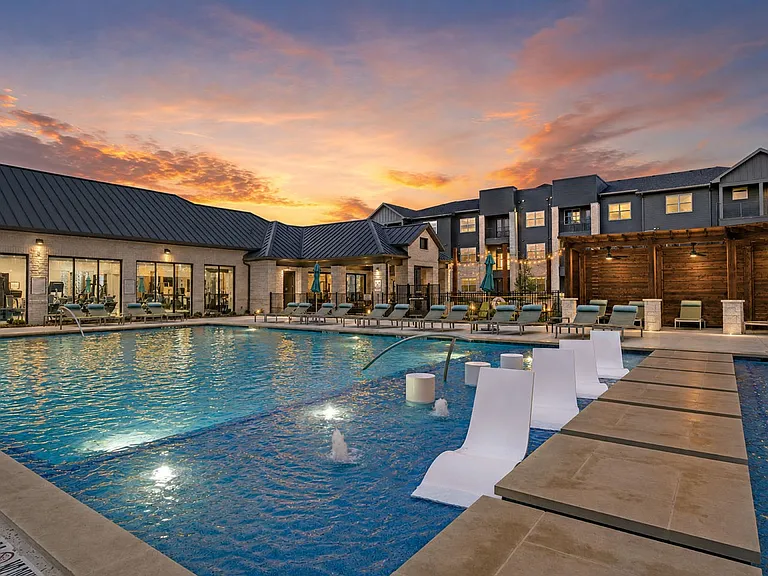 Unwind in luxury at Sage at Celina Residences. Enjoy the serene pool surrounded by stunning sunset views and modern amenities, perfect for relaxation. Elevate your lifestyle todayschedule a tour and see it for yourself!