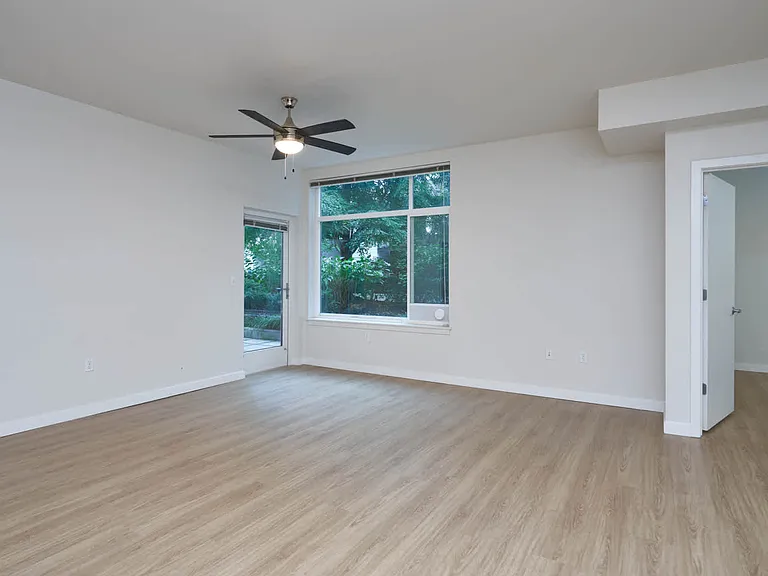Living Room with Balcony and Hard Surface Flooring
