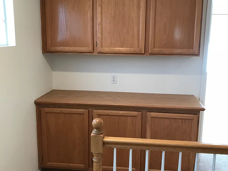 Linen closet at top of stairs