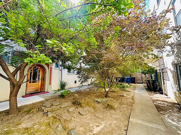 Gated courtyard to enter Haste St building