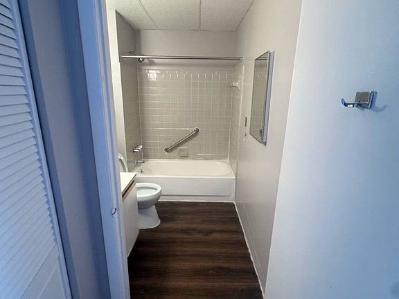 Representative Unit 304 bathroom, from the July 2025 property photo report. Features and layouts vary by apartment.