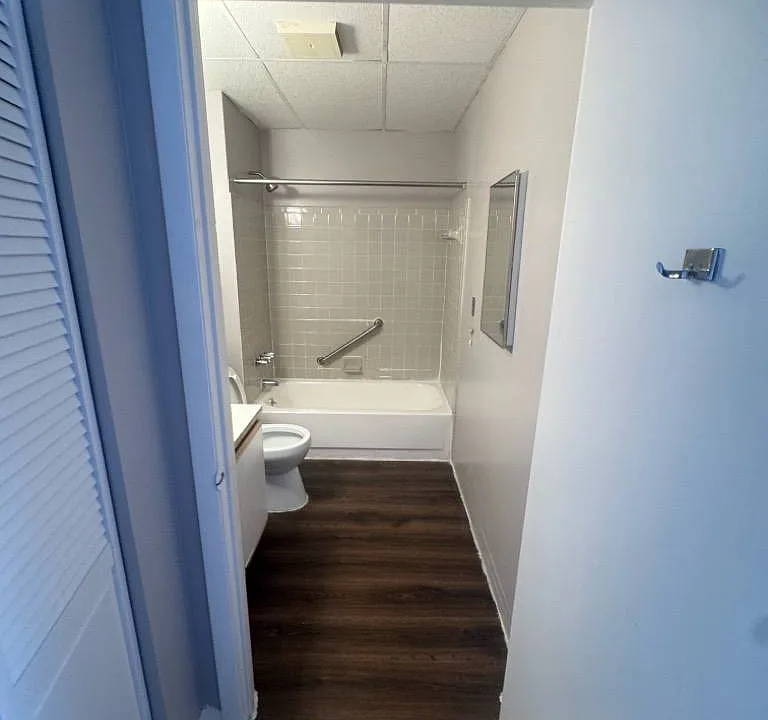 Representative Unit 304 bathroom, from the July 2025 property photo report. Features and layouts vary by apartment.