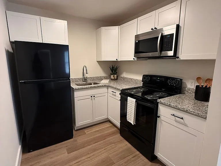 Live in Style at Riverview Newly Renovated Units Available Soon! — Photo 3