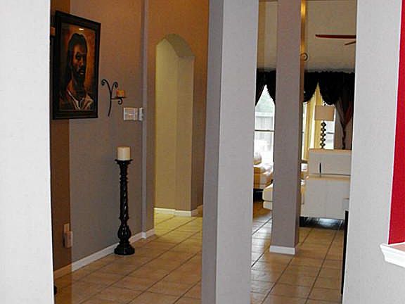 Tile floors to back of home