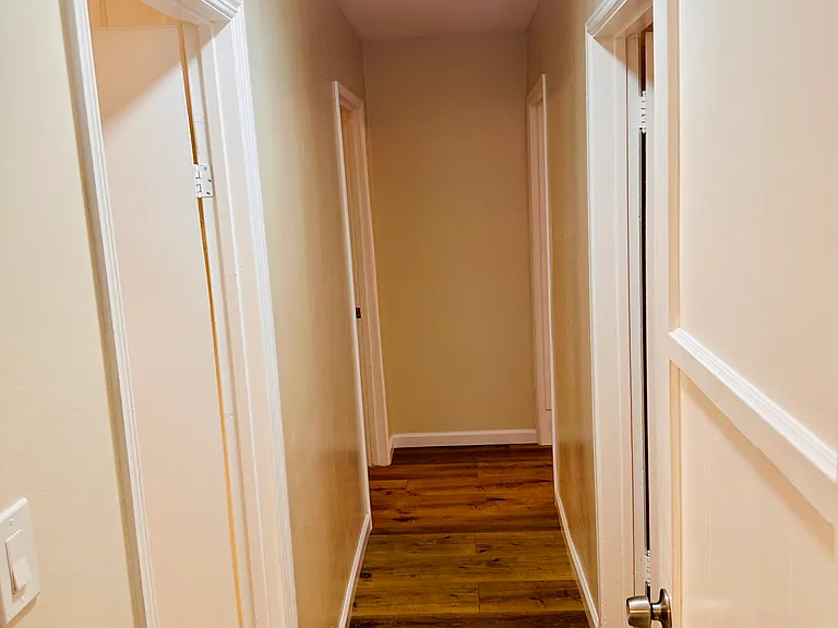 Hallway to bedrooms and main bathroom