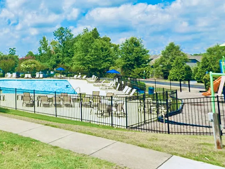 Pool with playground and clubhouse.
